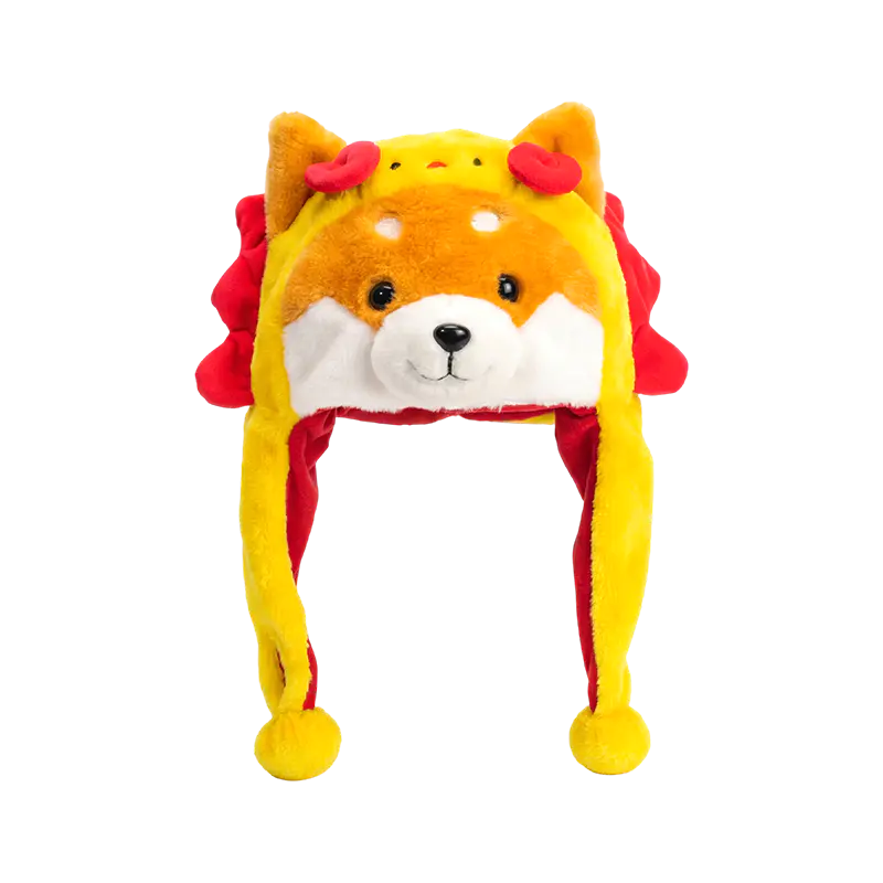 Žltá shiba s plyšovým klobúkom s červenou hrivou